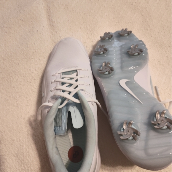 Nike Women's Size 8 golf shoes. White with aqua details. - Picture 2 of 2